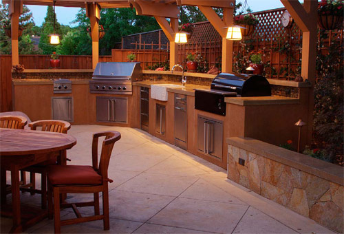 Concrete Countertops in an outdoor patio bring this backyard a new purpose.