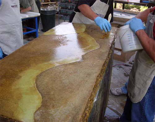 Epoxies are excellent at popping color. Also, they are self-leveling, so they create a smooth surface for preparing or eating food even if the concrete underneath is not perfectly smooth.