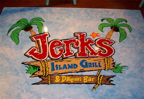 Finally, a custom Flattoo vinyl stencil from Surface Gel Tek depicting the restaurant's name among palm trees and broken wood planks was placed on the floor atop coatings of moisture-barrier epoxy and primer, then enhanced with hand-painted details and sealed with a urethane coating.