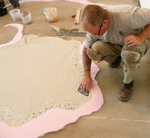 Bob Harris of the Decorative Concrete Institute embeds geodes, crushed glass and exotic aggregate into a stamped overlay.