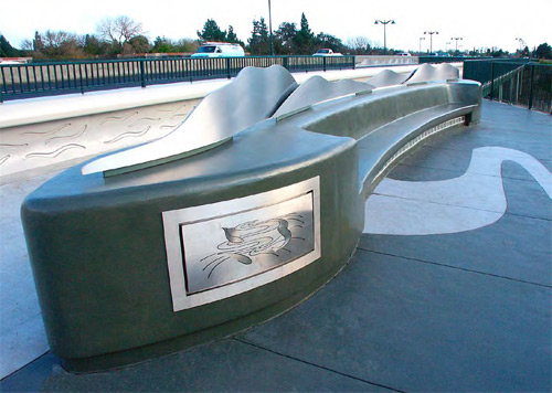 Concrete bench that takes on the shape of a wave acts as functional concrete art.