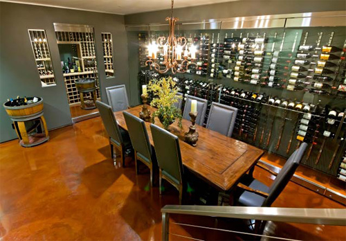 The wine tasting room is upgraded with an acid stain concrete floor.