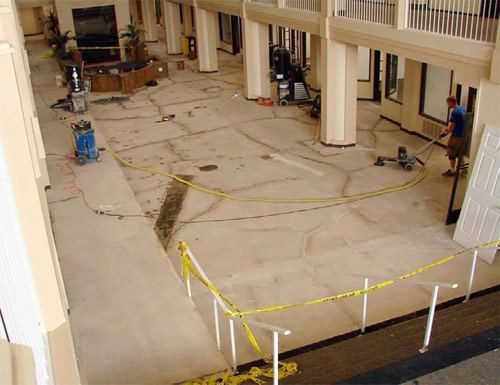 After the densifier was applied, the floor was honed using 100-grit, then 200-grit mixed resin blocks. Then it was polished using 400-grit resin diamonds.