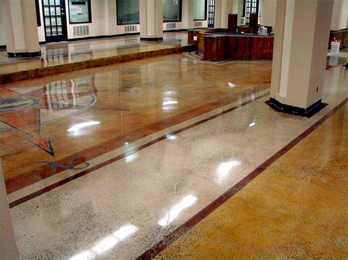 For the edges Colour used a standup edging machine and plenty of hand grinding. The budget didn’t allow for the monumental task of polishing the edges, so Colour used an edge tint to create dark brown borders that complement the color of the baseboards.